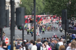 Th peloton approaches one of the feed zones during the Prudential RideLondon Classique, a 66 km road race in London on July 30, 2016 in the United Kingdom. ©Velofocus